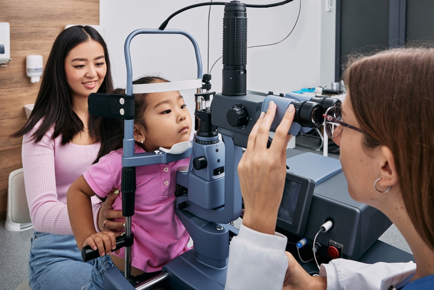 A parent who’s brought their child to the eye care provider to check for eye conditions