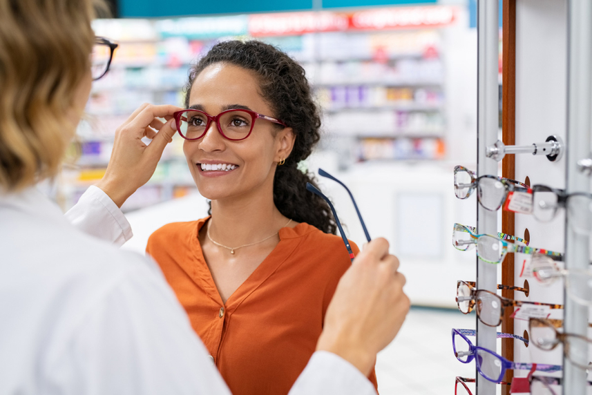 Woman trying on glasses