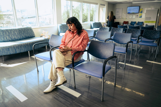 Woman sitting in waiting room